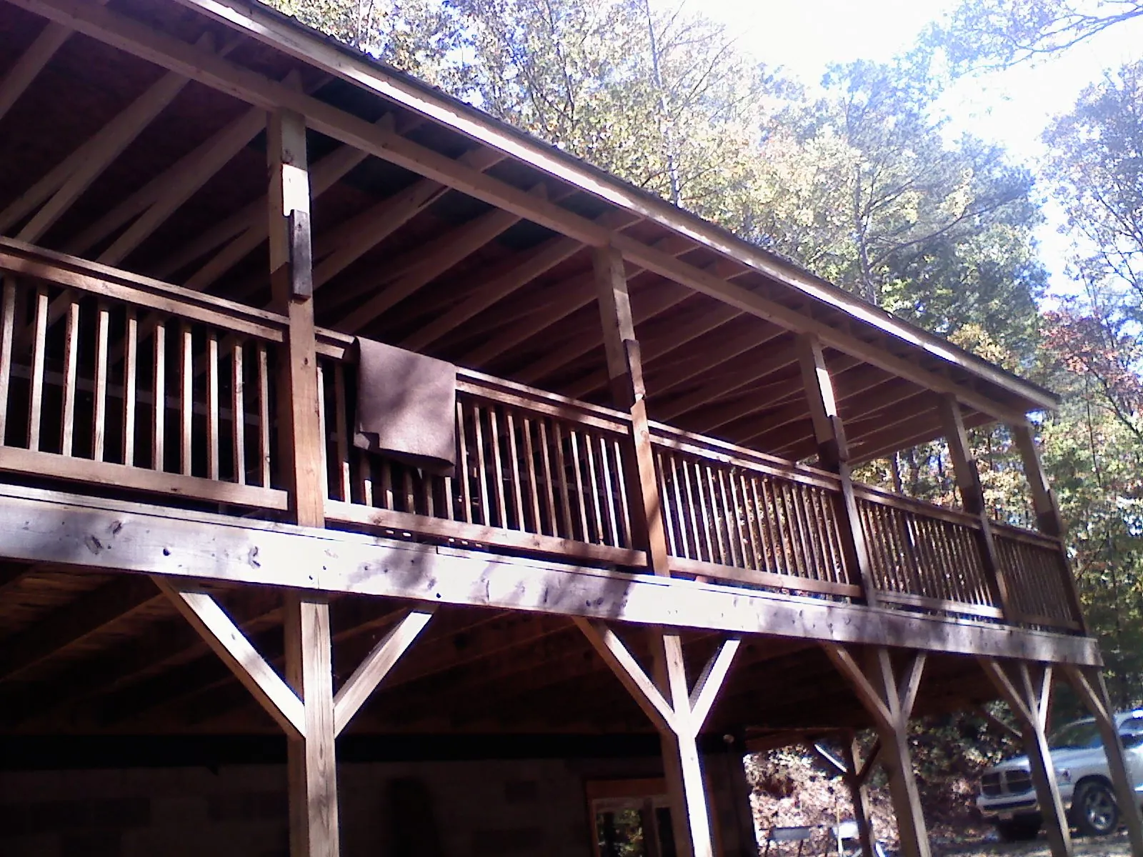 Timber framing under a new elevated porch and deck — Roof Leak Repair in Alvarado by Roofing Brothers